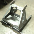 Steel front loader assembly for an industrial conduit pipe bender