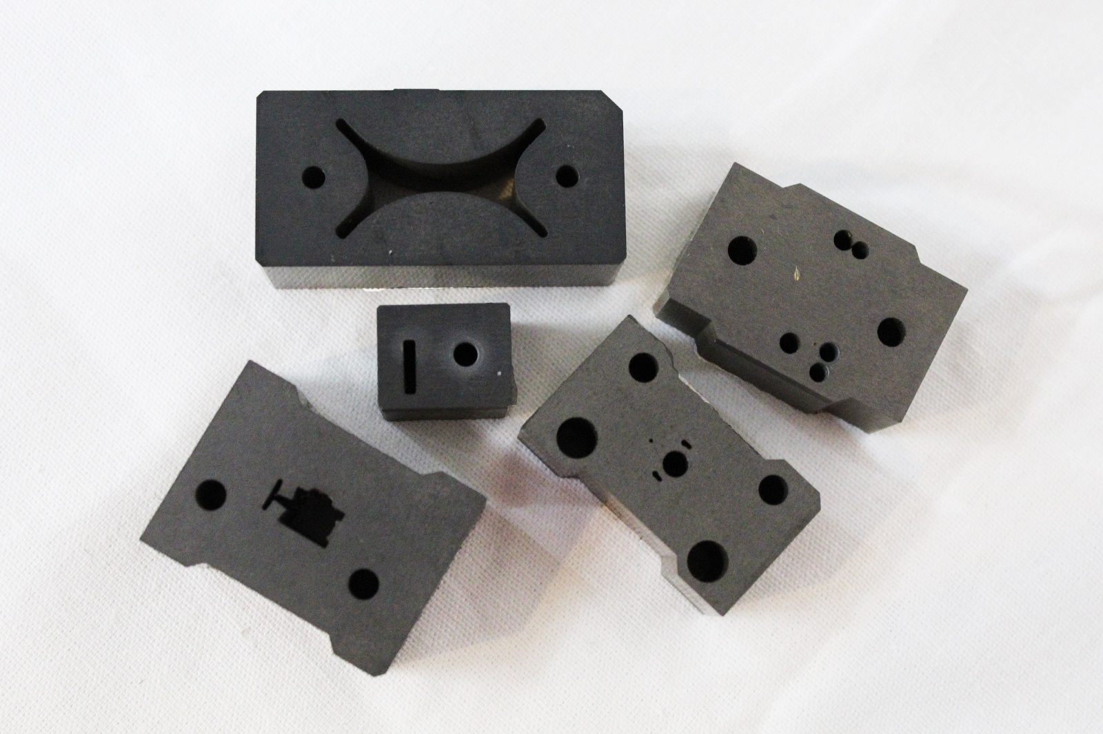 Top view of carbide wire EDM die blocks for the computer hardware industry 