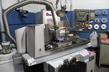 Steel CNC Grinding being automated on an Amada Meister V3