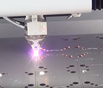5000-watt fiber laser cutter in action in the metal fabrication department