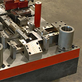 Progressive Metal Stamping die for a carbon steel safety unit bracket for the automotive industry