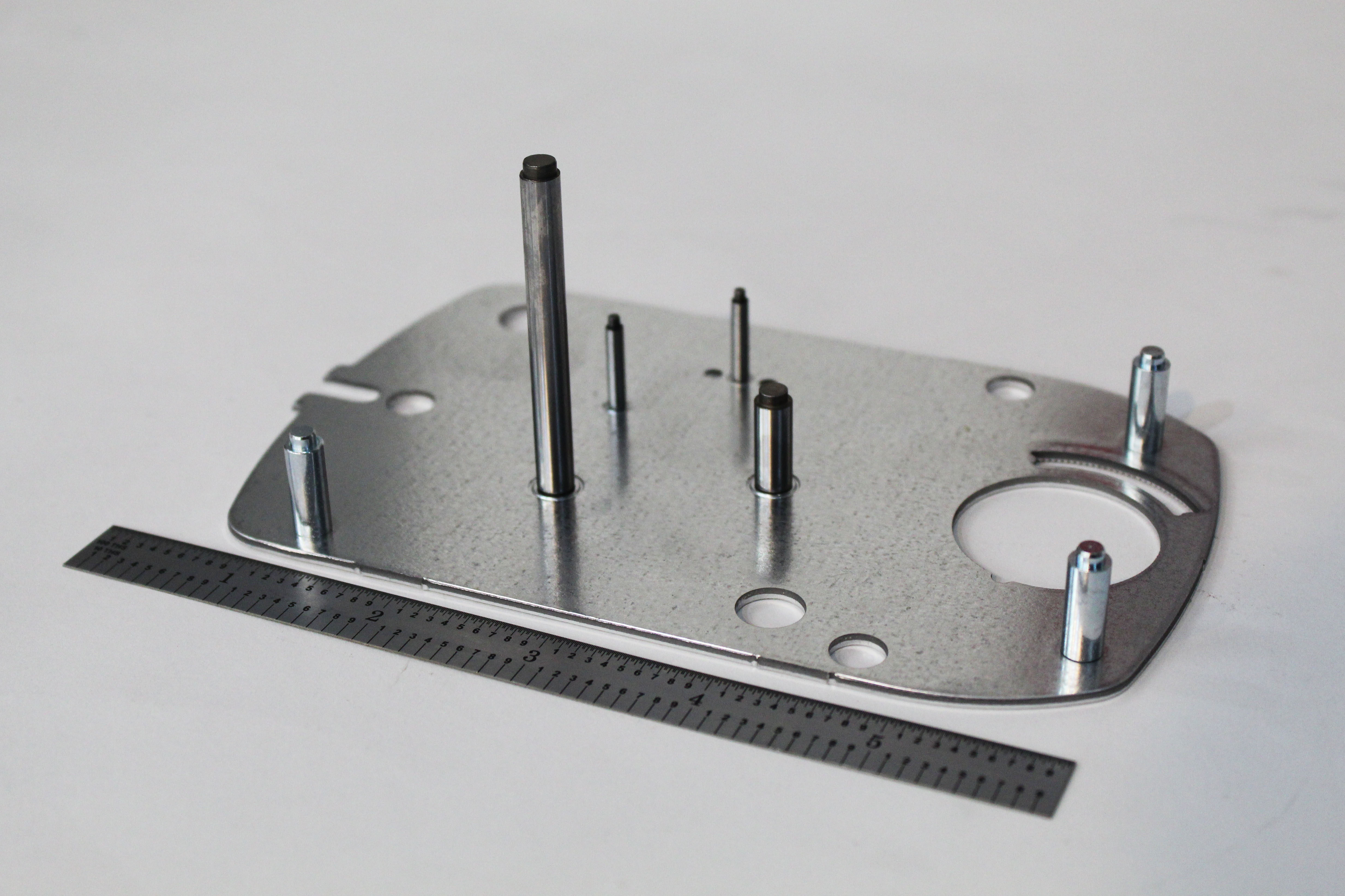 Close up of sub-assembly mounting bracket with studs