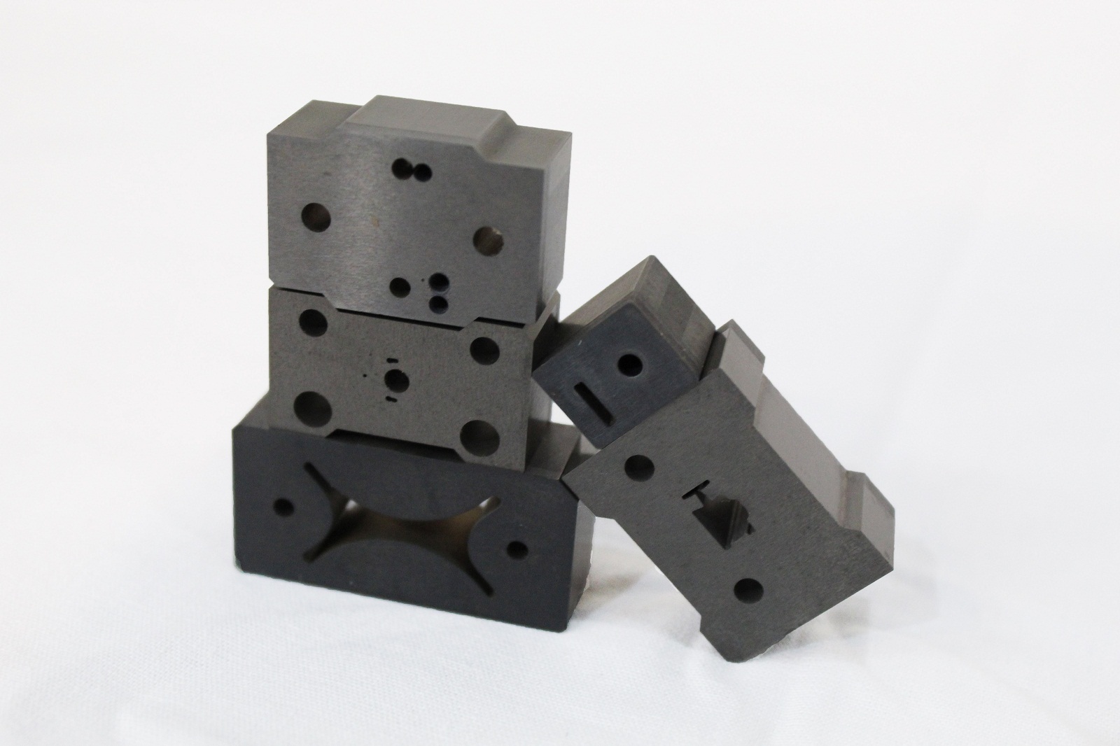 Stacked carbide wire EDM die blocks for the computer hardware industry
