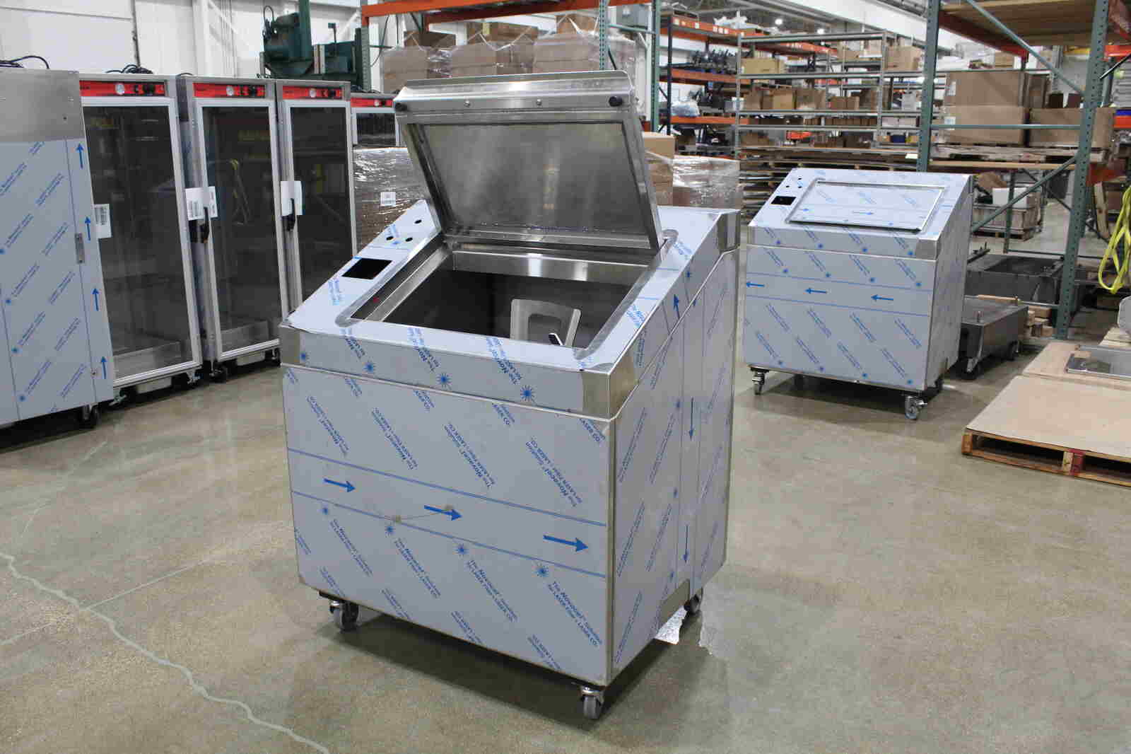 Full front view of a stainless steel food service biodigester