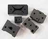 Top view of carbide wire EDM die blocks for the computer hardware industry